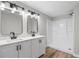 Bathroom with a double sink vanity, granite countertops, modern fixtures, and a walk-in shower at 1758 Bridgestone Ct, Marietta, GA 30066
