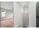 Hallway with wood floors and a view into another room at 1758 Bridgestone Ct, Marietta, GA 30066