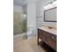 Bathroom with a glass shower and vanity that offers both style and functionality at 2400 Honey Ct, Mcdonough, GA 30252