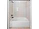 Bathroom featuring white tile shower with a shower head and neutral-colored tile floors at 2400 Honey Ct, Mcdonough, GA 30252