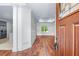 Inviting foyer with hardwood floors leading into an open-concept living area at 2400 Honey Ct, Mcdonough, GA 30252