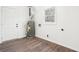 Unfinished basement area with visible mechanicals and a standard access door at 2401 Winshire Drive, Decatur, GA 30035