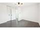 Bedroom with hardwood flooring, a ceiling fan, and a closet at 2401 Winshire Drive, Decatur, GA 30035