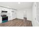 Kitchen features modern appliances, white cabinets, and hardwood floors, offering ample space at 2401 Winshire Drive, Decatur, GA 30035