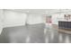 Open-concept living room featuring hardwood floors, recessed lighting, and glass patio doors to the exterior at 2401 Winshire Drive, Decatur, GA 30035