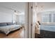 Bedrooms featuring ceiling fans, hardwood floors, and shuttered windows at 2479 Peachtree Ne St # 1414, Atlanta, GA 30305
