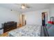 Bedroom with a ceiling fan, dresser, walk in closet, and hardwood floors at 2479 Peachtree Ne St # 1414, Atlanta, GA 30305
