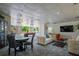 Open-concept game room with a lounge area, billiard table, and a serene outdoor view at 2479 Peachtree Ne St # 1414, Atlanta, GA 30305