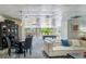Large community room with a pool table, several seating areas, and lots of natural light at 2479 Peachtree Ne St # 1414, Atlanta, GA 30305