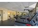 Community gym including treadmills and weight-lifting equipment with mirrors at 2479 Peachtree Ne St # 1414, Atlanta, GA 30305