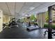 Fitness center featuring various exercise machines, large windows, and plenty of natural light at 2479 Peachtree Ne St # 1414, Atlanta, GA 30305