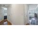 Hallway view into the bedroom and dining area featuring wood floors and neutral wall color at 2479 Peachtree Ne St # 1414, Atlanta, GA 30305