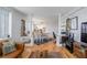 Comfortable living and dining areas featuring hardwood floors, neutral walls, and lots of natural light at 2479 Peachtree Ne St # 1414, Atlanta, GA 30305