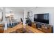 Open floor plan view of living and dining area with hardwood floors and neutral walls at 2479 Peachtree Ne St # 1414, Atlanta, GA 30305