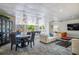 Lounge featuring ample seating, a dining area, and a billiards table, perfect for entertaining guests at 2479 Peachtree Ne St # 1414, Atlanta, GA 30305