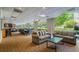 Community lounge space with plenty of seating areas and large windows showing serene outdoor views at 2479 Peachtree Ne St # 1414, Atlanta, GA 30305