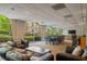 Lounge area offering comfortable seating, a dining area, and panoramic windows with natural light at 2479 Peachtree Ne St # 1414, Atlanta, GA 30305