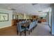 Community residents lounge with seating, bar, and long dining table for large groups at 2479 Peachtree Ne St # 1414, Atlanta, GA 30305