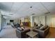 Community residents lounge with a variety of seating arrangements and a long bar for entertaining at 2479 Peachtree Ne St # 1414, Atlanta, GA 30305