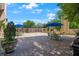 Outdoor patio with dining tables under umbrellas and manicured planters offers relaxing community space at 2479 Peachtree Ne St # 1414, Atlanta, GA 30305
