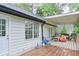 Back deck with outdoor furniture, a grill, and a view of the backyard at 405 Settlers Ridge Ln, Hiram, GA 30141