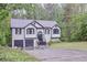 Charming two-story home featuring a well-maintained yard and a convenient two-car garage at 405 Settlers Ridge Ln, Hiram, GA 30141