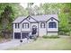 Charming two-story home featuring a well-maintained yard and a convenient two-car garage at 405 Settlers Ridge Ln, Hiram, GA 30141