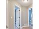 Hallway with open bathroom door and wood look floors at 405 Settlers Ridge Ln, Hiram, GA 30141