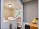 Laundry room with a washer, dryer, and window for natural light at 405 Settlers Ridge Ln, Hiram, GA 30141