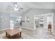 Spacious open-concept living area seamlessly connecting to the dining and kitchen spaces at 405 Settlers Ridge Ln, Hiram, GA 30141