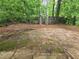 Natural backyard with tree coverage and wood fencing at 2365 Hackamore Dr, Atlanta, GA 30349