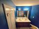 Stylish bathroom featuring a double sink vanity, modern lighting, and shower at 2365 Hackamore Dr, Atlanta, GA 30349