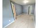 Cozy bedroom with neutral carpeting and paint, featuring two doorways at 2365 Hackamore Dr, Atlanta, GA 30349