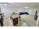 Open-concept kitchen and living room with an island, sleek appliances, and a comfortable blue sofa set at 2365 Hackamore Dr, Atlanta, GA 30349