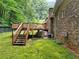 Multi-level backyard deck with access to fenced yard and basement at 4293 Smithsonia Dr, Tucker, GA 30084