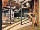 Unfinished basement featuring exposed pipes, and block foundation walls at 4293 Smithsonia Dr, Tucker, GA 30084