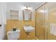 Vintage bathroom featuring a glass shower, sink, and a classic toilet with yellow tile at 4293 Smithsonia Dr, Tucker, GA 30084
