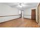 Spacious bedroom with hardwood floors and a ceiling fan offering a comfortable retreat at 4293 Smithsonia Dr, Tucker, GA 30084
