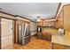 Kitchen view featuring stainless steel appliances, wood cabinets, wood flooring and a ceiling fan at 4293 Smithsonia Dr, Tucker, GA 30084