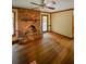 Living room with hardwood floors and brick fireplace at 4293 Smithsonia Dr, Tucker, GA 30084