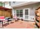 Fenced patio with seating provides an outdoor space for relaxing and entertaining guests at 786 Brookside Parc Ln, Avondale Estates, GA 30002