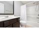 Updated bathroom with modern vanity, toilet, and shower-tub combo at 786 Brookside Parc Ln, Avondale Estates, GA 30002