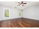 Bedroom features hardwood floors, vaulted ceilings, and plenty of natural light at 786 Brookside Parc Ln, Avondale Estates, GA 30002