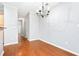 Dining area with hardwood flooring and light fixture at 786 Brookside Parc Ln, Avondale Estates, GA 30002