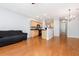 Open living and kitchen area with hardwood flooring, offering a modern and comfortable living space at 786 Brookside Parc Ln, Avondale Estates, GA 30002