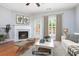 Living room features a fireplace, and lots of natural light at 786 Brookside Parc Ln, Avondale Estates, GA 30002
