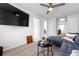 Loft area featuring a large flat screen tv and comfortable lounge seating at 9913 Stretford Rd, Douglasville, GA 30135