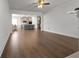 Open-concept living room flows into a modern kitchen with a large center island at 9913 Stretford Rd, Douglasville, GA 30135