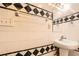 Bathroom featuring tiled walls, and a pedestal sink at 1723 Ritcherson Se St, Marietta, GA 30060