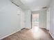 Hallway shows access to rooms, wood-look flooring, and neutral paint at 1723 Ritcherson Se St, Marietta, GA 30060